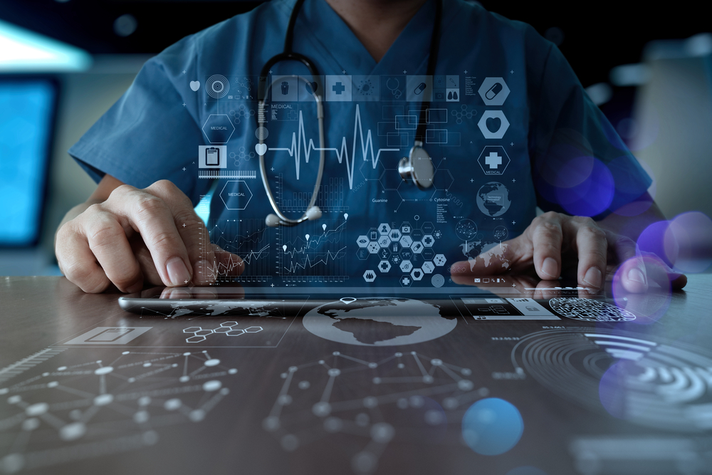 composite image of unidentified doctor working at a computer